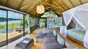 A guest room at Victoria Falls River Lodge