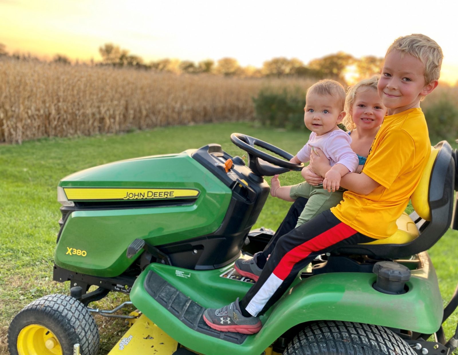 Jayme - Kids on Tractor - Travel Beyond