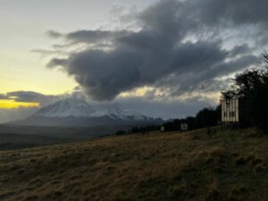 Sunset over mountain with lodge