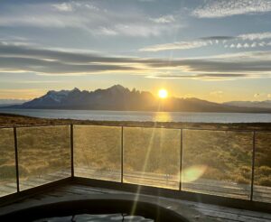 Sunrise over mountain, pool on deck
