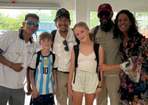 family with their guides in the Galapagos Islands.