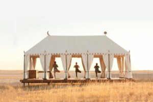 People doing yoga in a tent at San Camp