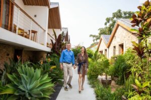 People walking down a scenic sidewalk