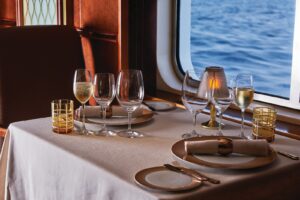 Dining table with drinks on the Silver Wind.