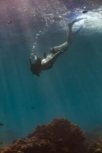 Woman snorkeling in Bali.