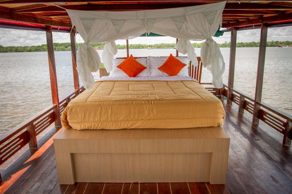 Bed on a Klotok in Indonesia.