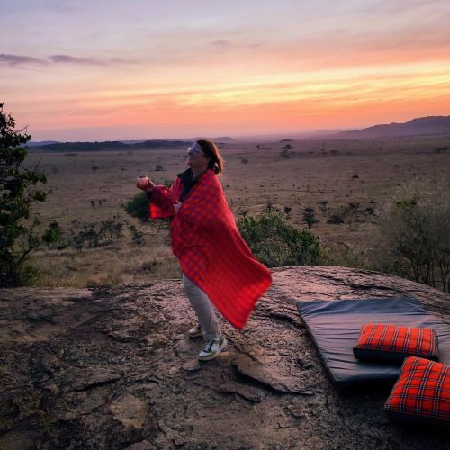 A person standing on a rock in Kenya