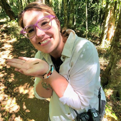 Woman holding a worm