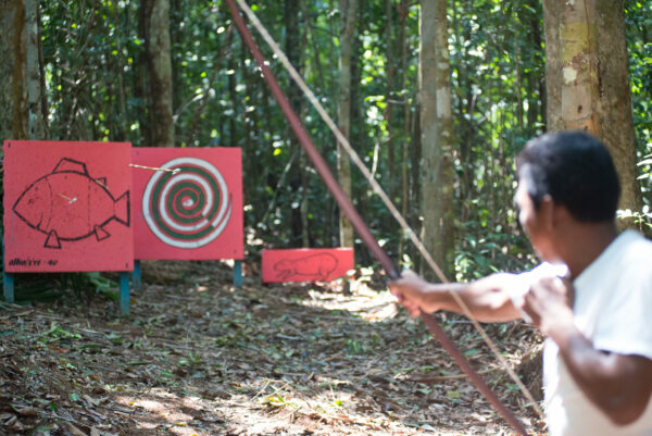 Bow and arrow instruction at Anavihanas Lodge in Brazil.